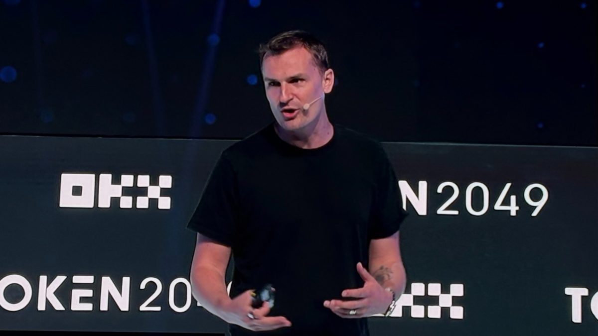 Jesse Pollak speaking at a crypto event